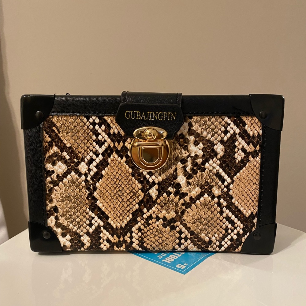 Small snake print trunk purse